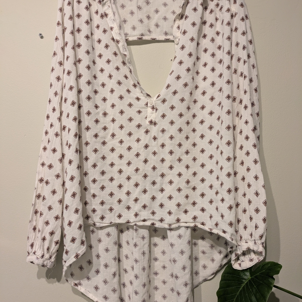 Wild Pearl Cream Asymmetrical Cut Out Blouse